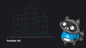 An ASCII image of a block of flats, next to an image of Bit the Raccoon.