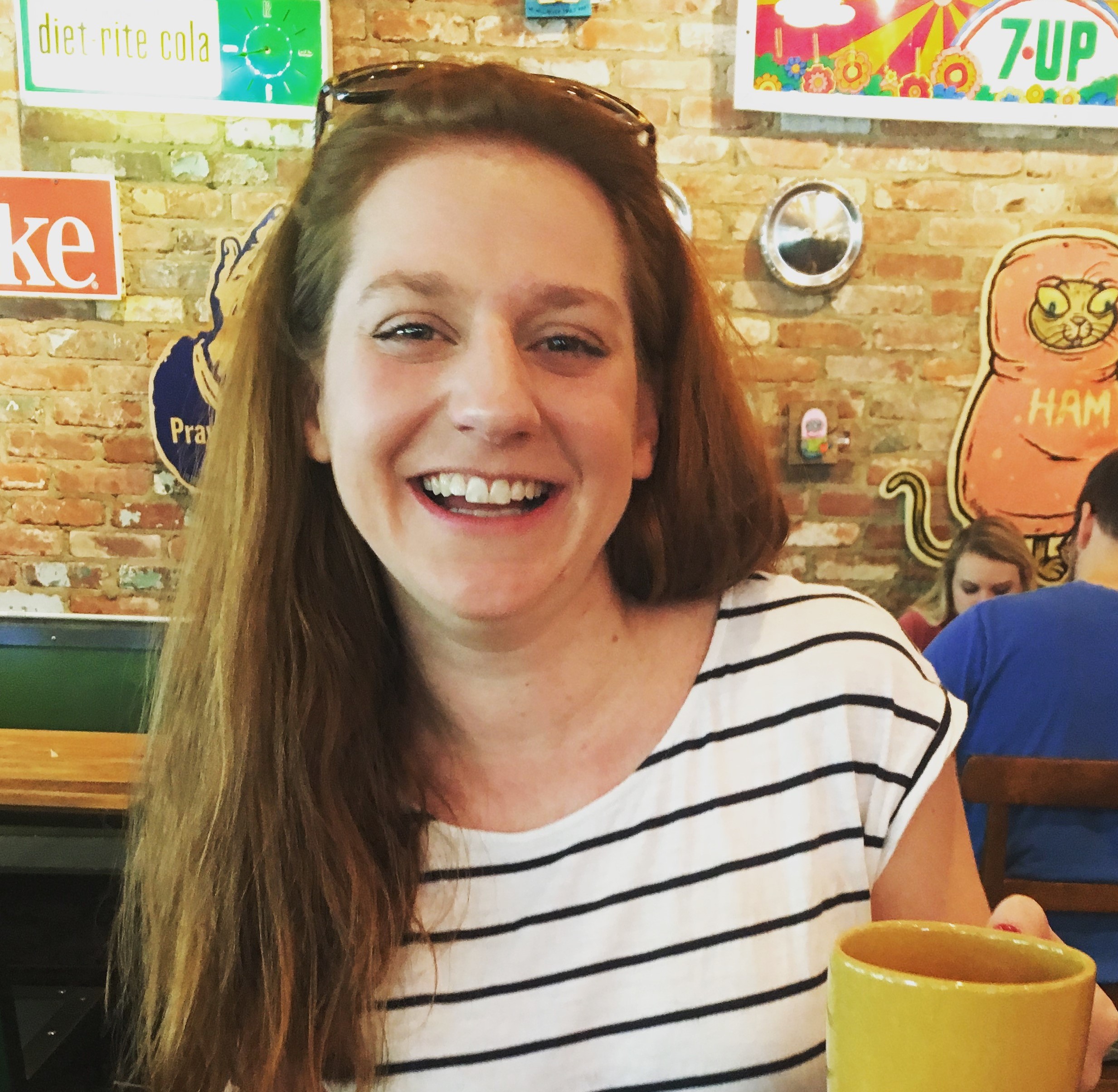 Liz Leigh-Bower smiling at the camera.