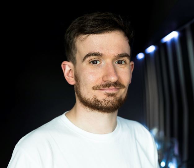 Luke Stamper smiles at the camera