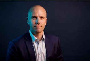 a man wearing a suit and tie