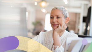 A woman with her hand on her chin