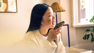 A woman holding a phone