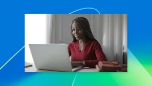 a person standing in front of a laptop