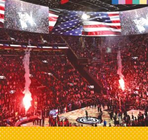 Basketball arena full of fans and fireworks.