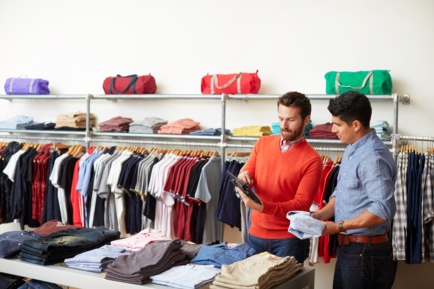 a group of people standing in a room