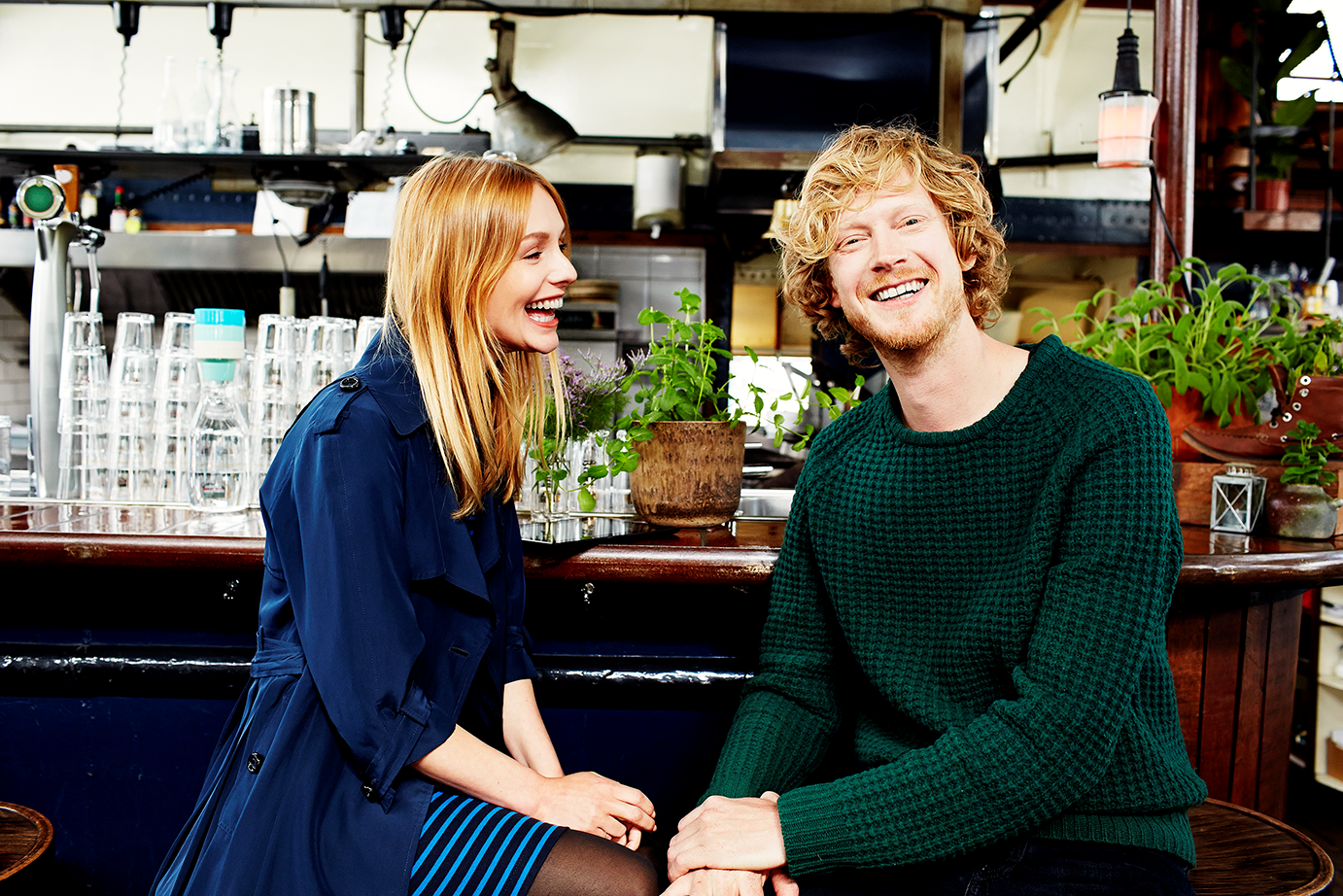 a group of people sitting at a table
