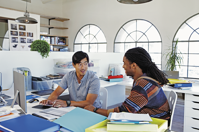 a group of people sitting at a table