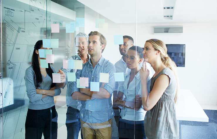 a group of people standing in a room