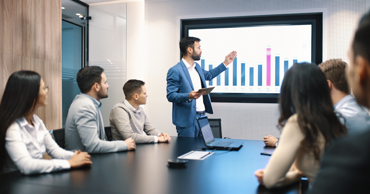 a group of people sitting at a table