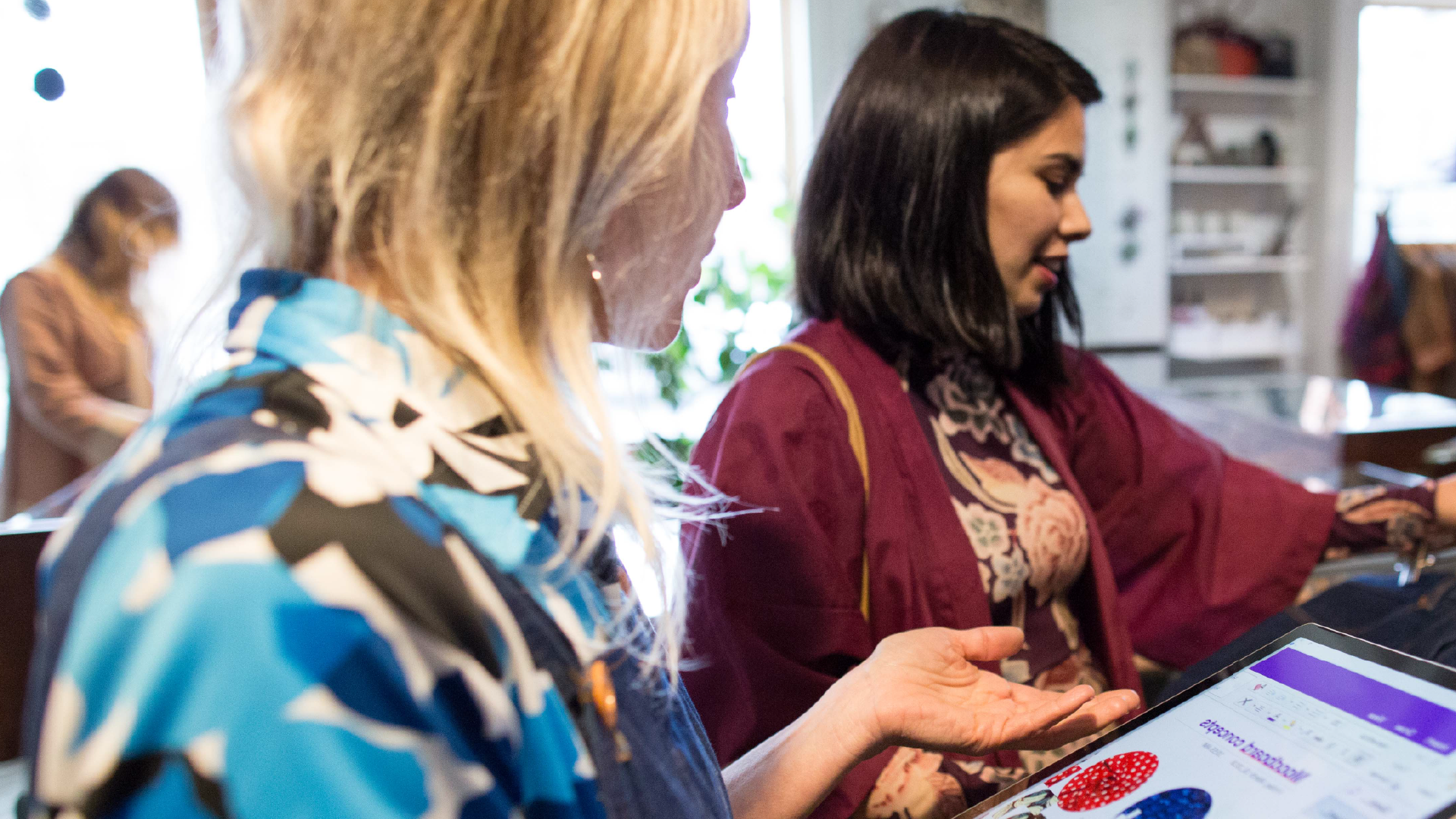a woman sitting at a table