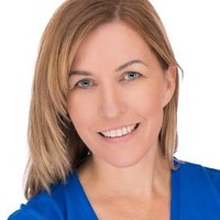 Professional headshot of Lunaura Hassinger