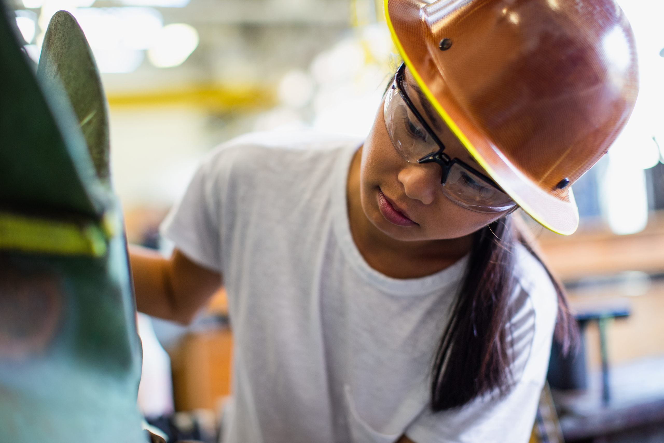 Female worker in shipbuilder&lsquo;s machine shop.