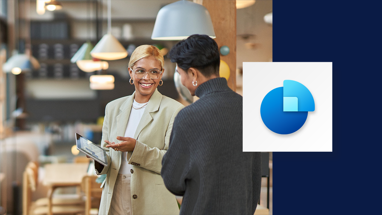 A business owner looking at a tablet next to the Dynamics 356 Sales logo