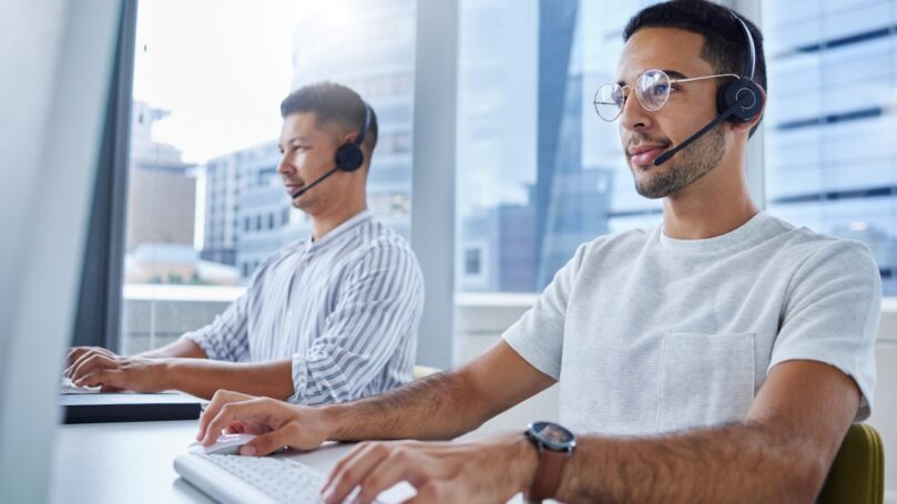 two men in a call center