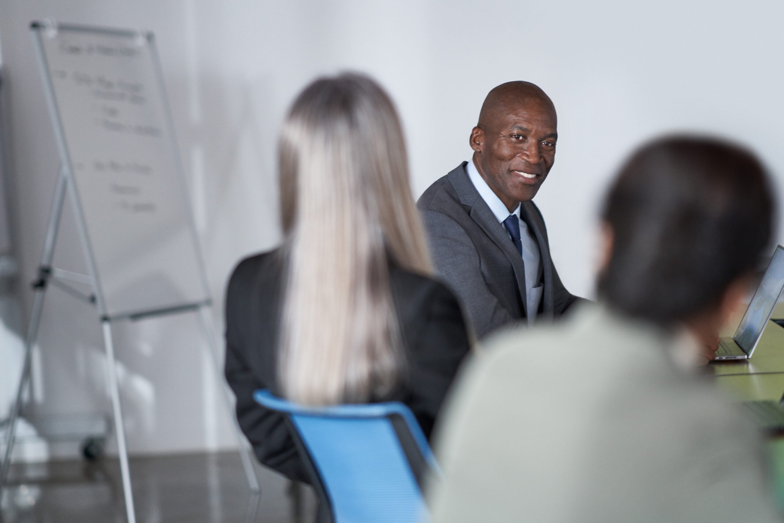 Multiple professions sitting in an office