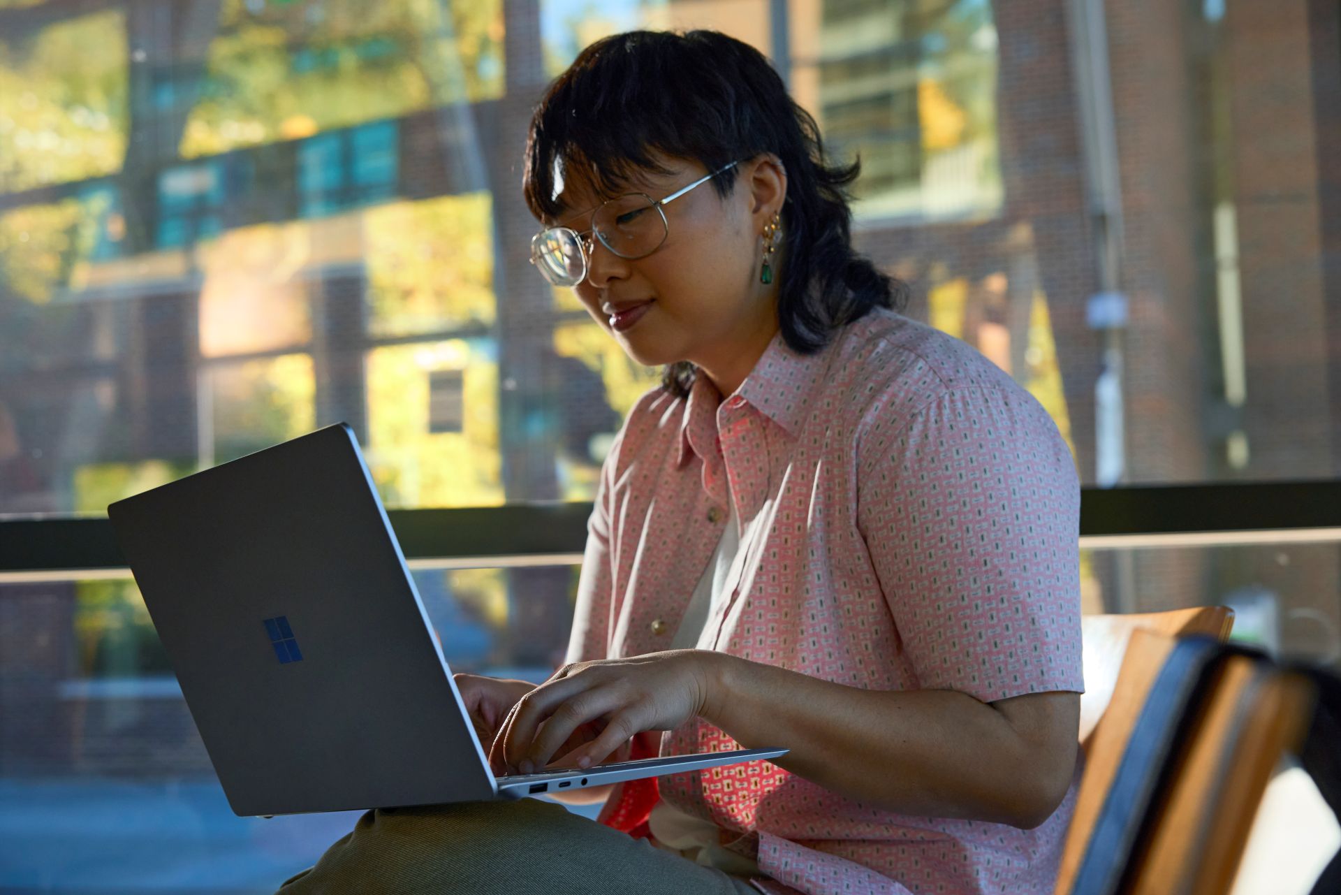 An educator working on cybersecurity lessons for students