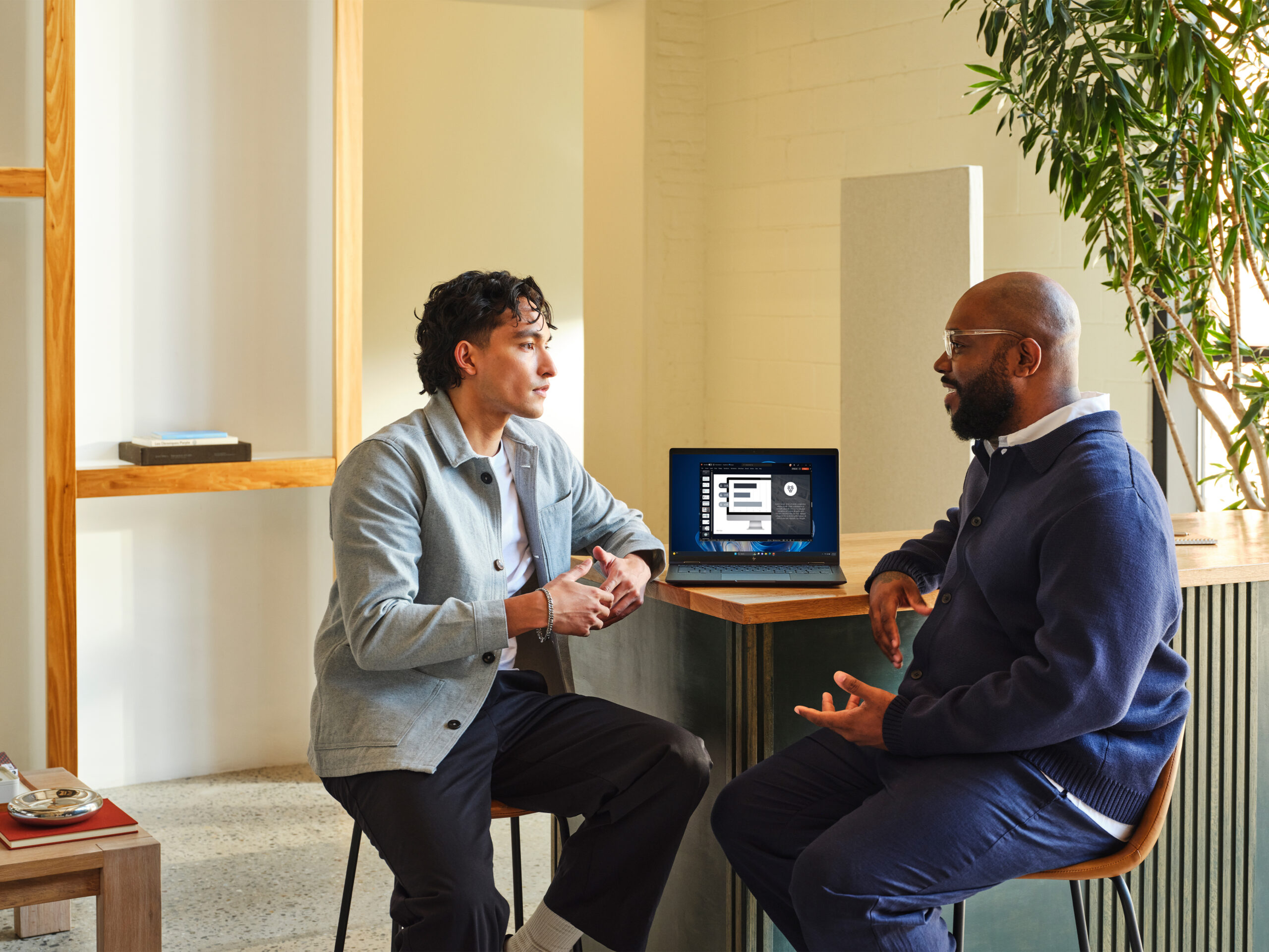 A device being used by a team in an office space using Windows 365.