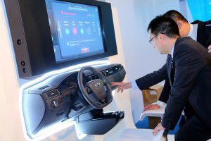 An image of two people interacting with Qoros Automative