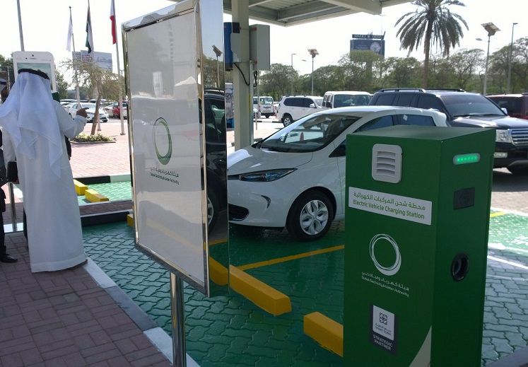 Picture of a car parked at an EV charging station in Dubai