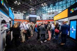 People crowding around Microsoft booth at NRF