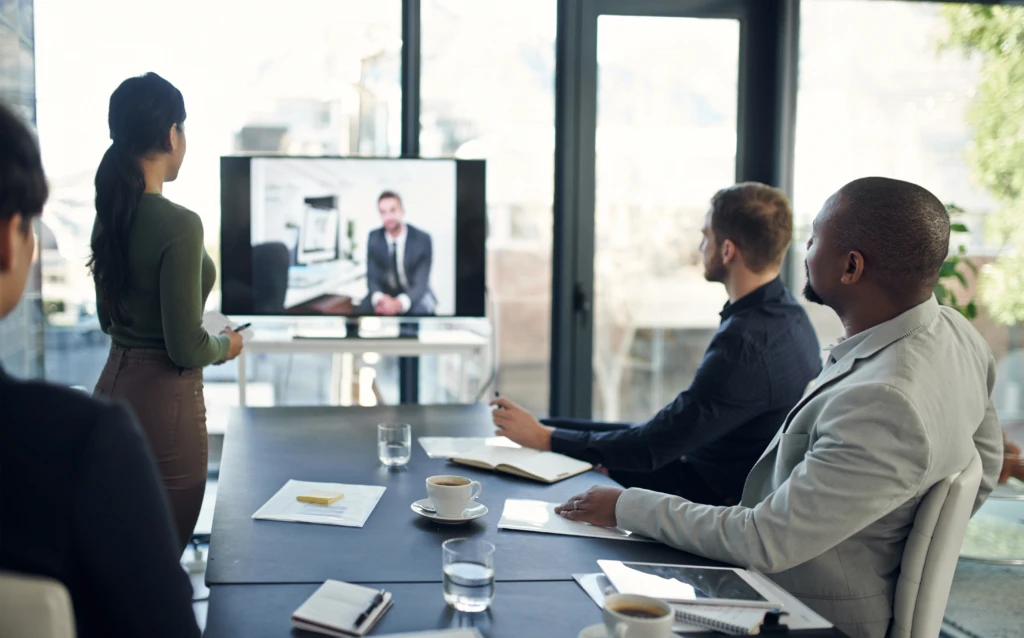 a group of people sitting at a table