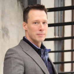 a man wearing a suit and tie