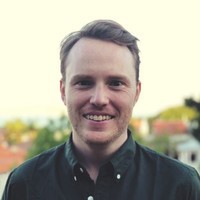 a man smiling for the camera