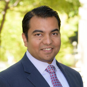 Professional headshot of Vidhu Shekhar.