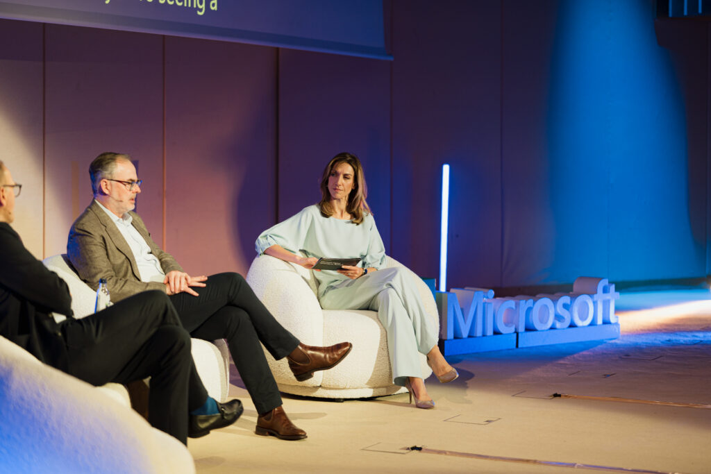Three speakers on stage at the 2026 Microsoft Digital Sovereignty Summit.