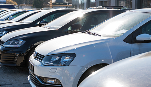 Several white and black cars