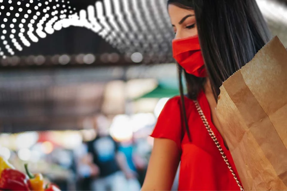 Das Bild zeigt eine Person beim Einkaufen.