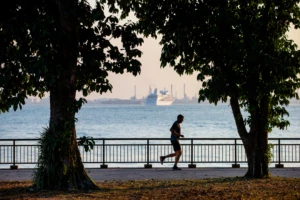 A man running outside. Taking breaks during the day to help improve employee experience and create positive culture change