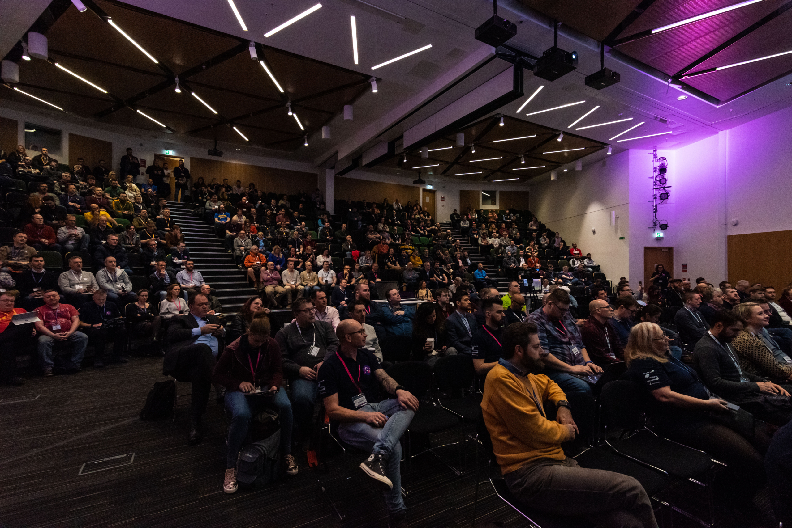 A photo of a large audience in a seminar room, taken at Scottish Summit 2020.