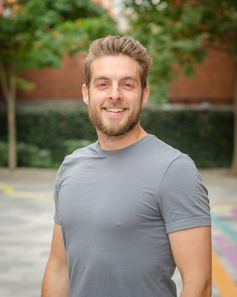 A portrait photograph of Tiernan Mines, CEO of Hello Lamp Post