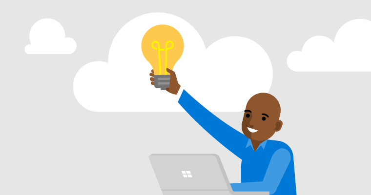 Man holding up light bulb