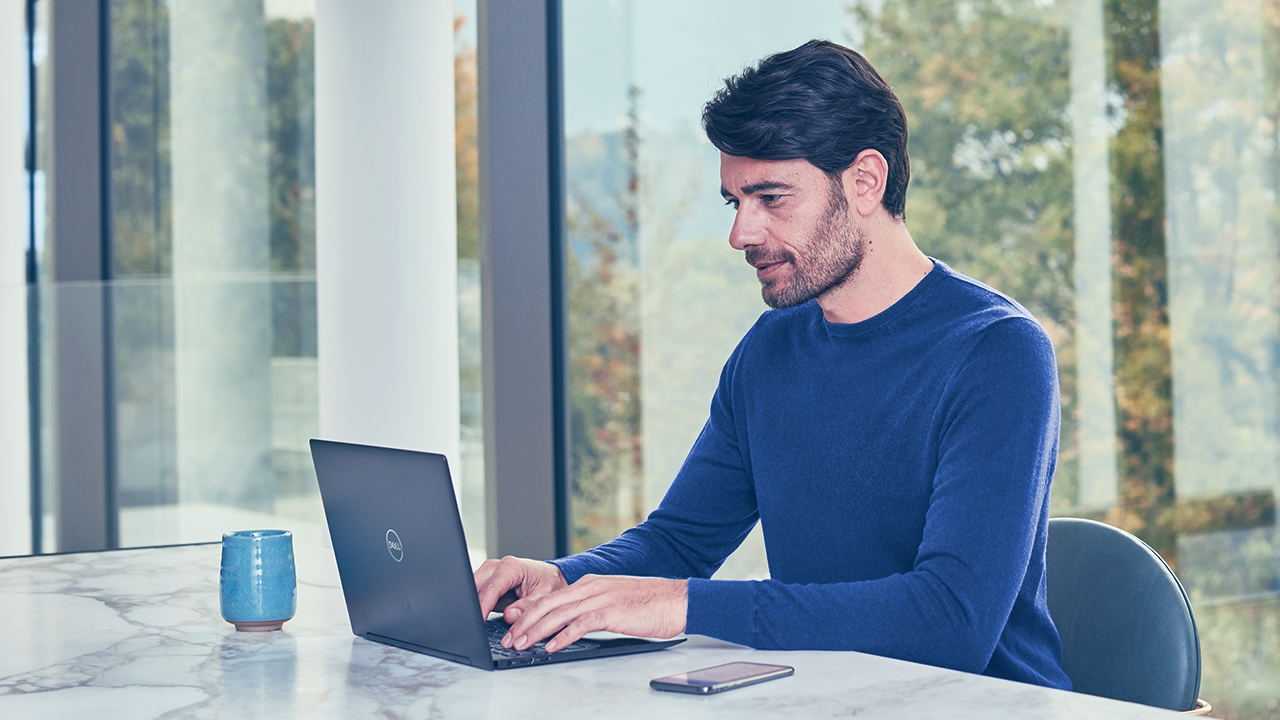 man working on his laptop.