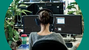 Woman infront of computer monitor