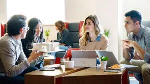 a group of people sitting at a table