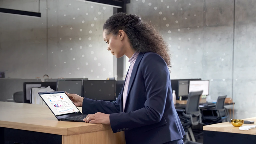 woman looking at her laptop