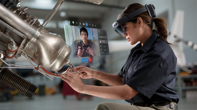 Image of a worker wearing mixed reality goggles.
