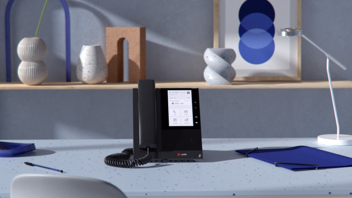 Teams certified device on white desk.