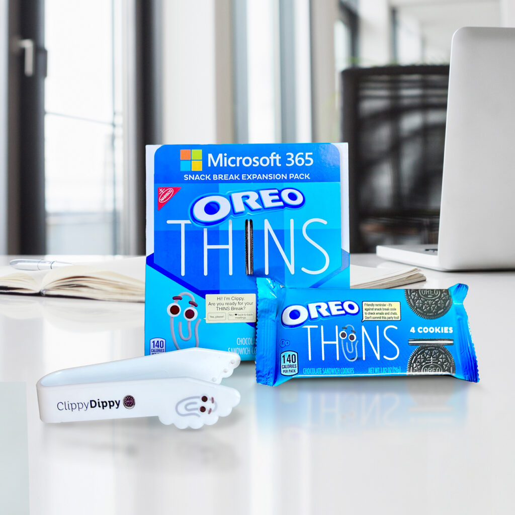 Limited-edition OREO THINS Snack Break Expansion Cookie Pack. Each expansion pack includes custom-packaged OREO THINS emblazoned with helpful office tips from Microsoft’s iconic office assistant, Clippy, plus a special accessory, the must-have Clippy Dippy, designed to keep your hands milk-free while dunking cookies during your snack break.