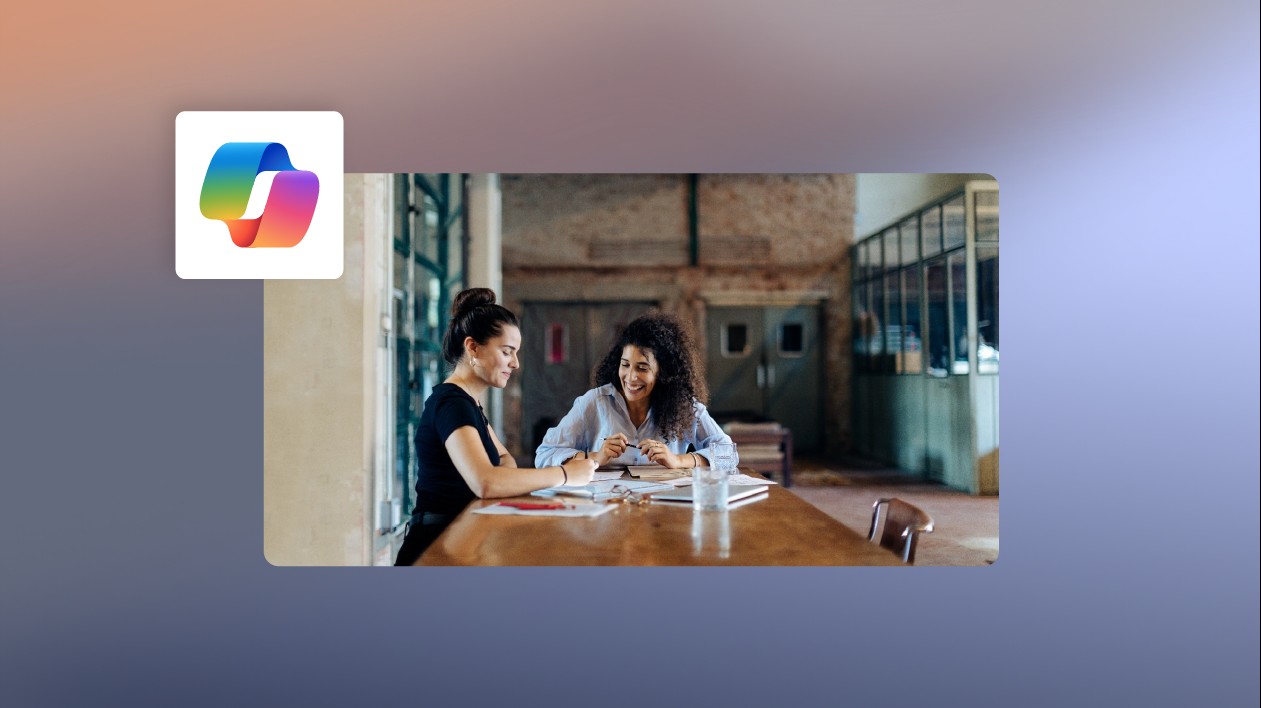 A decorative image of two small business professionals working on a business proposal