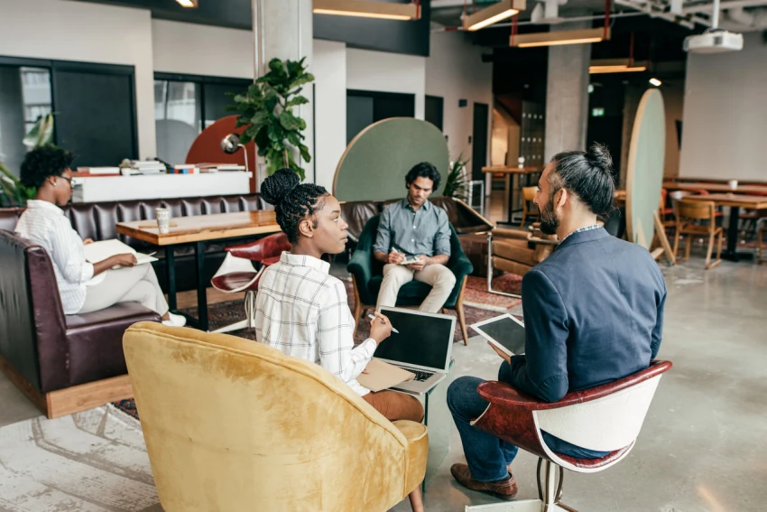 A group of colleagues having a meeting