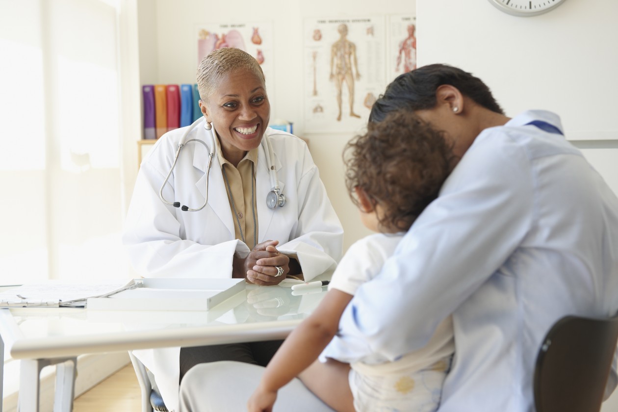 A doctor talking to patients