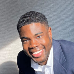 A man smiling at the camera