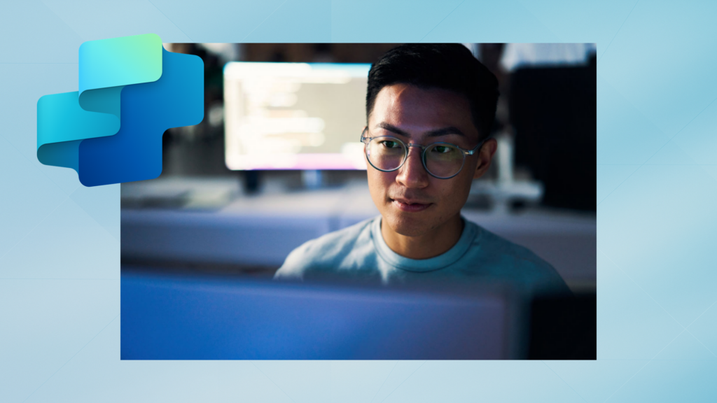 A man looking at a computer screen