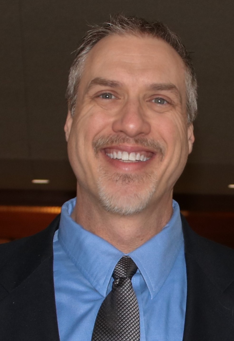 Headshot of Dan Houdek