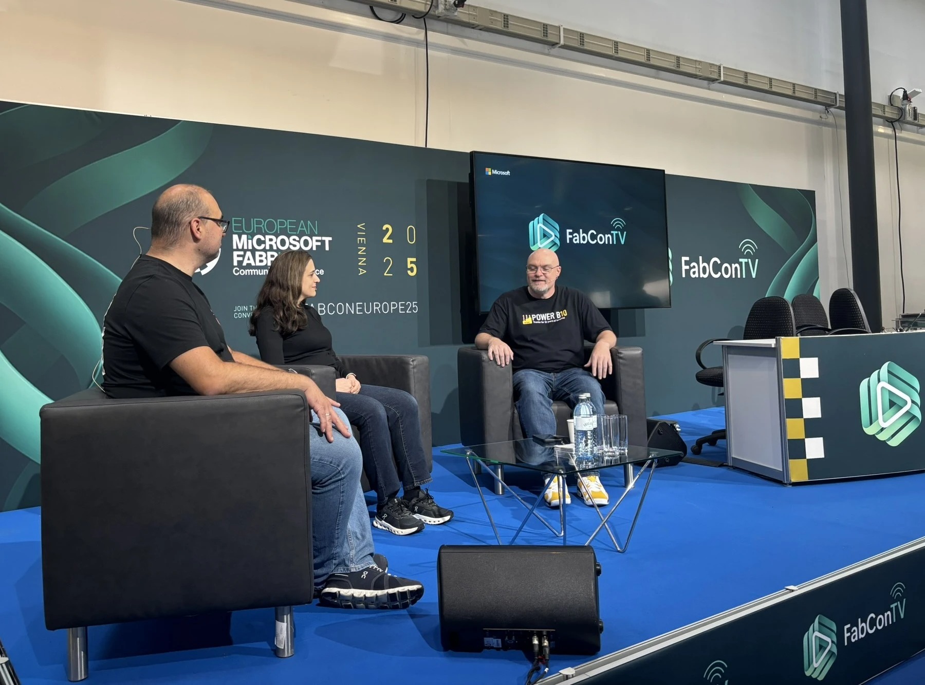 A panel of speakers sit on stage for FabConTV.