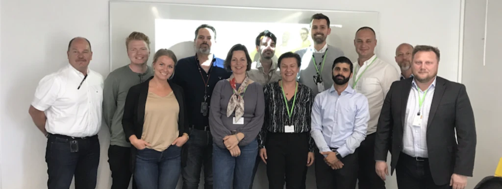 a group of people posing for a photo